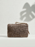 Back view brown woven fabric clutch bag with animal print texture zipper top wristlet strap and small side tab