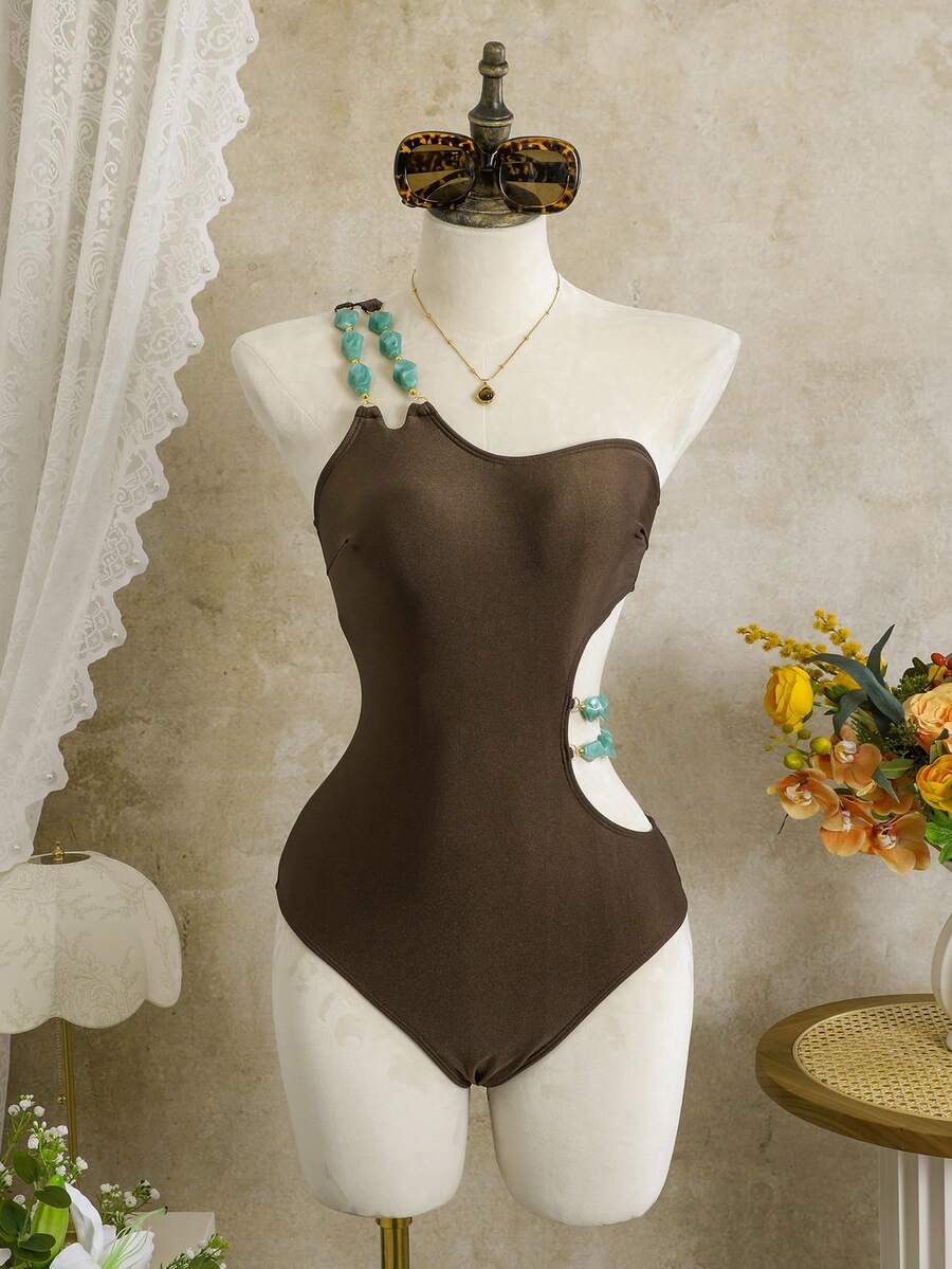 Discover effortless elegance with this strapless one-piece swimsuit, designed for the modern beach lover. The clean, solid color silhouette flatters every figure while the strapless neckline offers a chic, minimalist look perfect for sun-soaked vacations. Crafted for comfort and style, this versatile piece transitions seamlessly from poolside lounging to beachside strolls. Whether you're planning a spring getaway or summer escape.