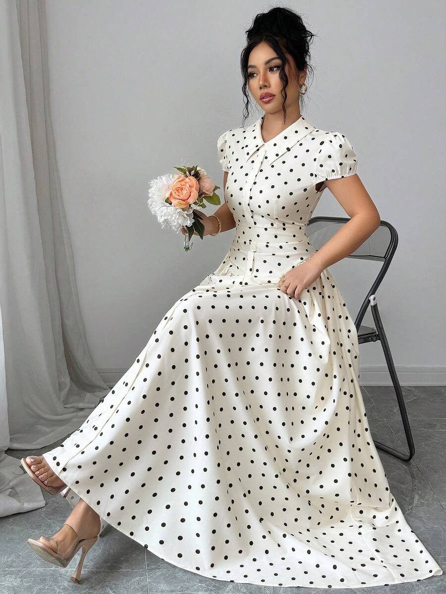 Experience the breathtaking fusion of heritage vintage artistry and sharp, modern architectural tailoring. This stunning polka dot ensemble is meticulously designed for the woman who values a high-fashion, "quiet luxury" approach to seasonal dressing—the ultimate centerpiece for prestigious business environments, exclusive holiday retreats, and high-authority corporate events.
