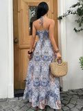 Back view white blue tan paisley maxi dress with halter tie and smocked back