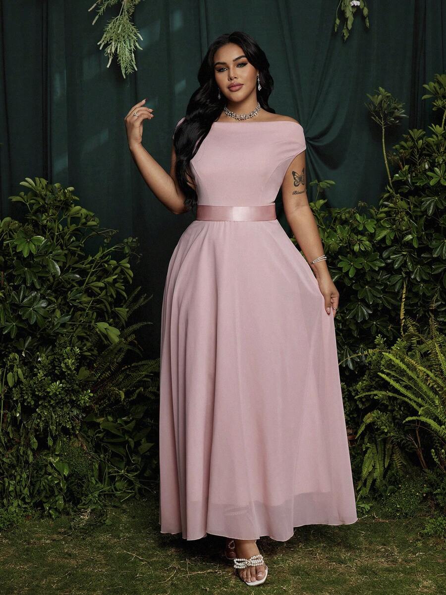 Experience the breathtaking fusion of romantic heritage and sharp, modern architectural tailoring. This stunning dusty pink ensemble is meticulously designed for the woman who values a high-fashion, "quiet luxury" approach to event dressing—the ultimate centerpiece for prestigious bridesmaid duties, exclusive formal galas, and high-authority celebration retreats.