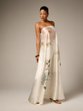 Front view of ivory strapless satin maxi dress with pale rose embroidery and flared hem