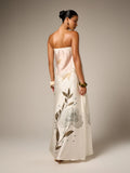 Back view of ivory floral embroidered maxi gown with long flowing skirt