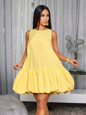 Front view of yellow sleeveless smock mini dress with round neck and voluminous bubble hem