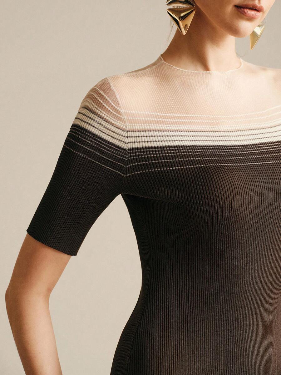 Elevate your wardrobe with this sophisticated maxi dress featuring an elegant color-block design in rich coffee brown. The semi-sheer fishnet detailing adds contemporary flair, while the slim-fit silhouette flatters your figure. Crafted from a breathable polyester-viscose blend with high stretch for comfort, this half-sleeve dress transitions seamlessly from special occasions to festive celebrations. The natural waistline and pencil hem create a refined, elongated look. Hand wash or dry clean for lasting el