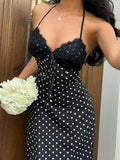 Capture effortless elegance with this blue plaid halter maxi dress, designed to blend classic charm with modern sophistication.