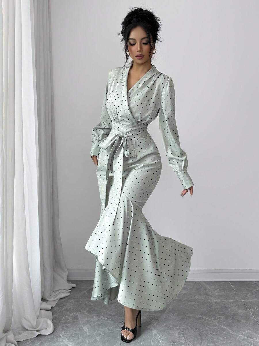 Timeless elegance meets playful style with this long sleeve wrap tie dress from the Selianne Collection. The classic polka dot pattern adds a touch of vintage charm, while the wrap design flatters every figure with adjustable tie closure at the waist. Crafted for versatility, this dress transitions seamlessly from office to evening occasions. The flowing fabric drapes beautifully, offering comfort and movement throughout your day. 