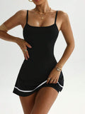 black adjustable strap active mini dress with white trim, open back, flared skirt and built in shorts image 1