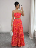 Styled view of floral strapless crop top and maxi skirt set showing visible color, print, and silhouette