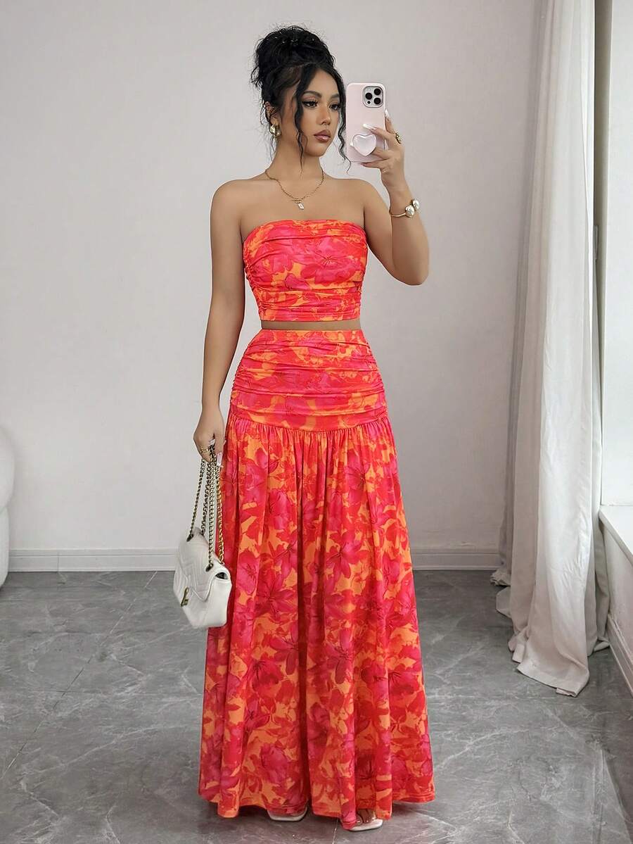 Styled view of floral strapless crop top and maxi skirt set showing visible color, print, and silhouette