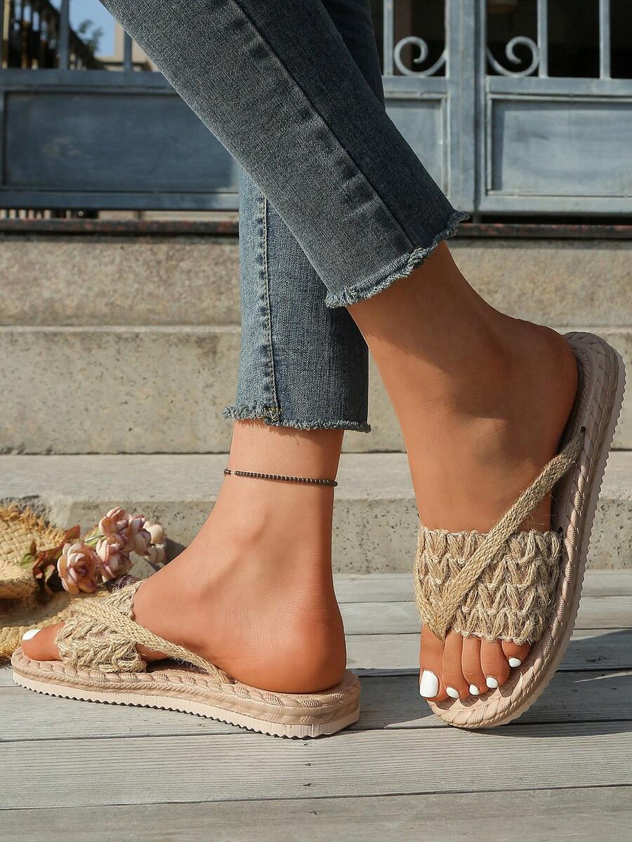 Side-front view of khaki woven flat sandals with low layered sole