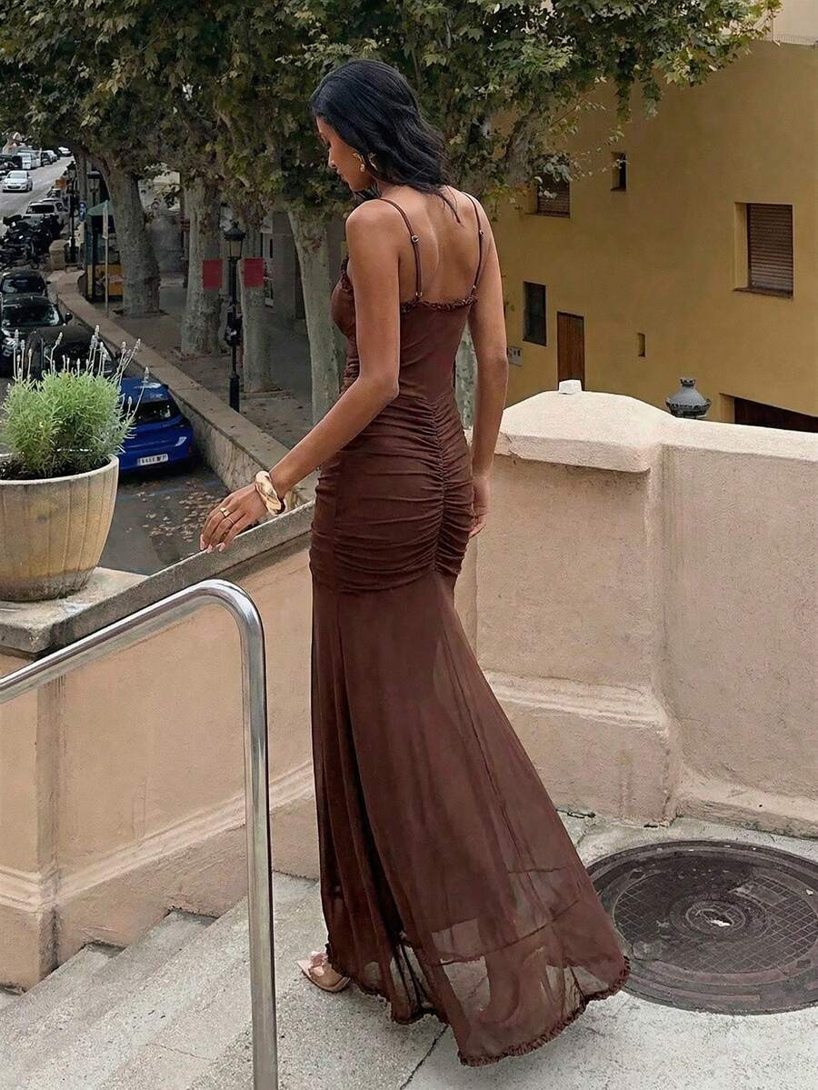 42 media show strappy mesh maxi dress in solids and prints with deep plunge V, front bead connector, ruffle trim, ruched bodice and hips, thigh slit, sheer flared lower skirt, low straight back, adjustable spaghetti straps. image 40