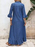 Back view of blue denim dress with flounce sleeves and long ruffled hem