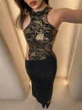 Close view of metallic gold botanical halter bodice and side cutout