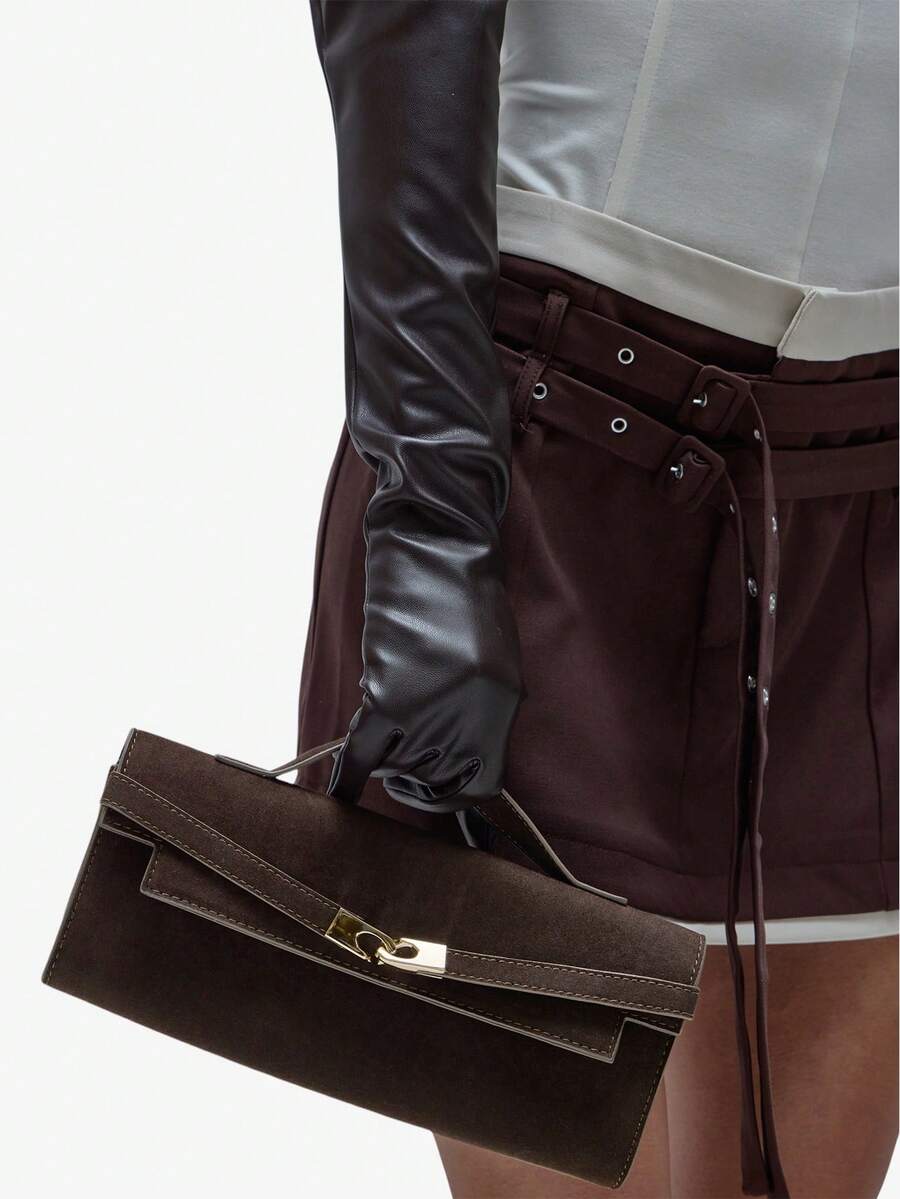 Dark brown faux suede top handle clutch bag with flap front and gold clasp