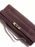Dark brown square clutch bag with diagonal strap band and turn lock closure