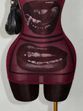 Close-up of burgundy mesh mini dress with framed lip graphic