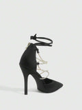 9 media show white black and pink satin pointed toe stiletto pumps with rhinestone crisscross instep cage straps, ankle wrap tie, side cutouts, tall back counter, back zipper. image 5