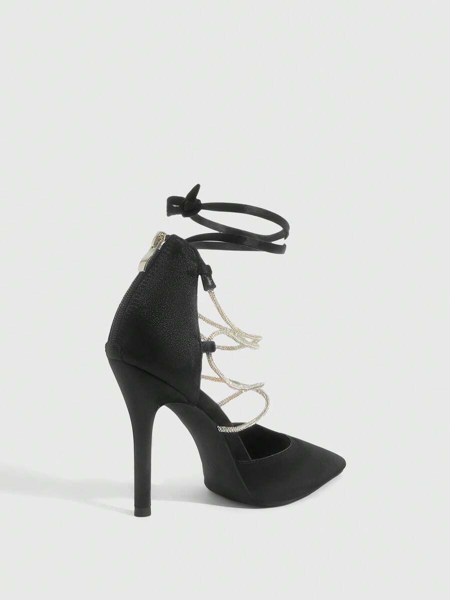 9 media show white black and pink satin pointed toe stiletto pumps with rhinestone crisscross instep cage straps, ankle wrap tie, side cutouts, tall back counter, back zipper. image 5