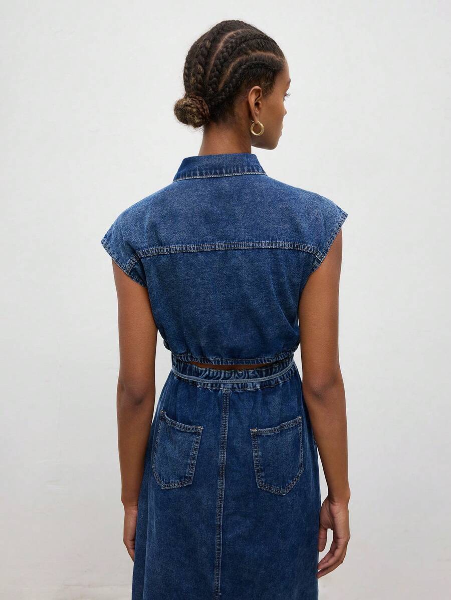 Shop an aqua blue denim shirt dress with bowknot and open back, perfect for autumn picnics, brunch, casual dates, weekends, and outdoor outings.