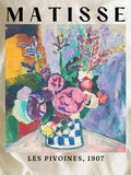 Close-up of colorful Matisse peony and checked vase print on apricot T-shirt