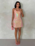 open back sequin cami mini dress with scoop neckline, spaghetti straps, crisscross tie back, fitted bodice, slight A-line mini skirt, iridescent sequin variants and orange floral print variant image 7