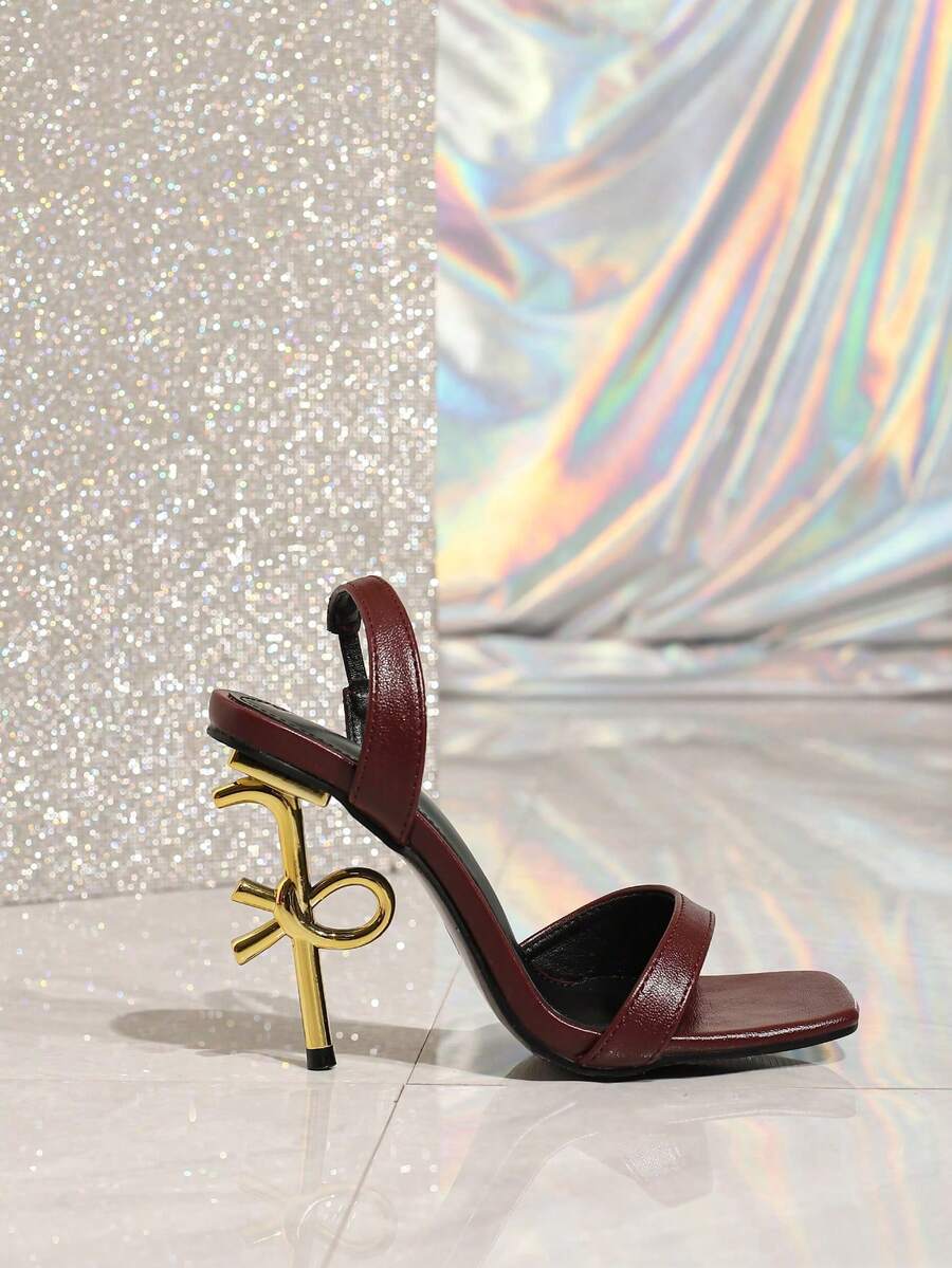 Step into sophistication with these stunning gold stiletto sandals, designed to elevate any summer occasion. Featuring a sleek square toe and elegant ankle strap, these high heels deliver both style and confidence. Crafted from premium PU leather with a durable rubber sole, they offer all-day comfort with a true-to-size fit. Perfect for parties, festivals, and special events, these versatile heels transition seamlessly from day to night. The sculptural heel provides a flattering silhouette while the buckle 