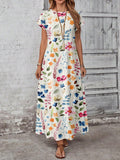 Close front view of multicolor floral maxi dress showing round neck and short sleeves