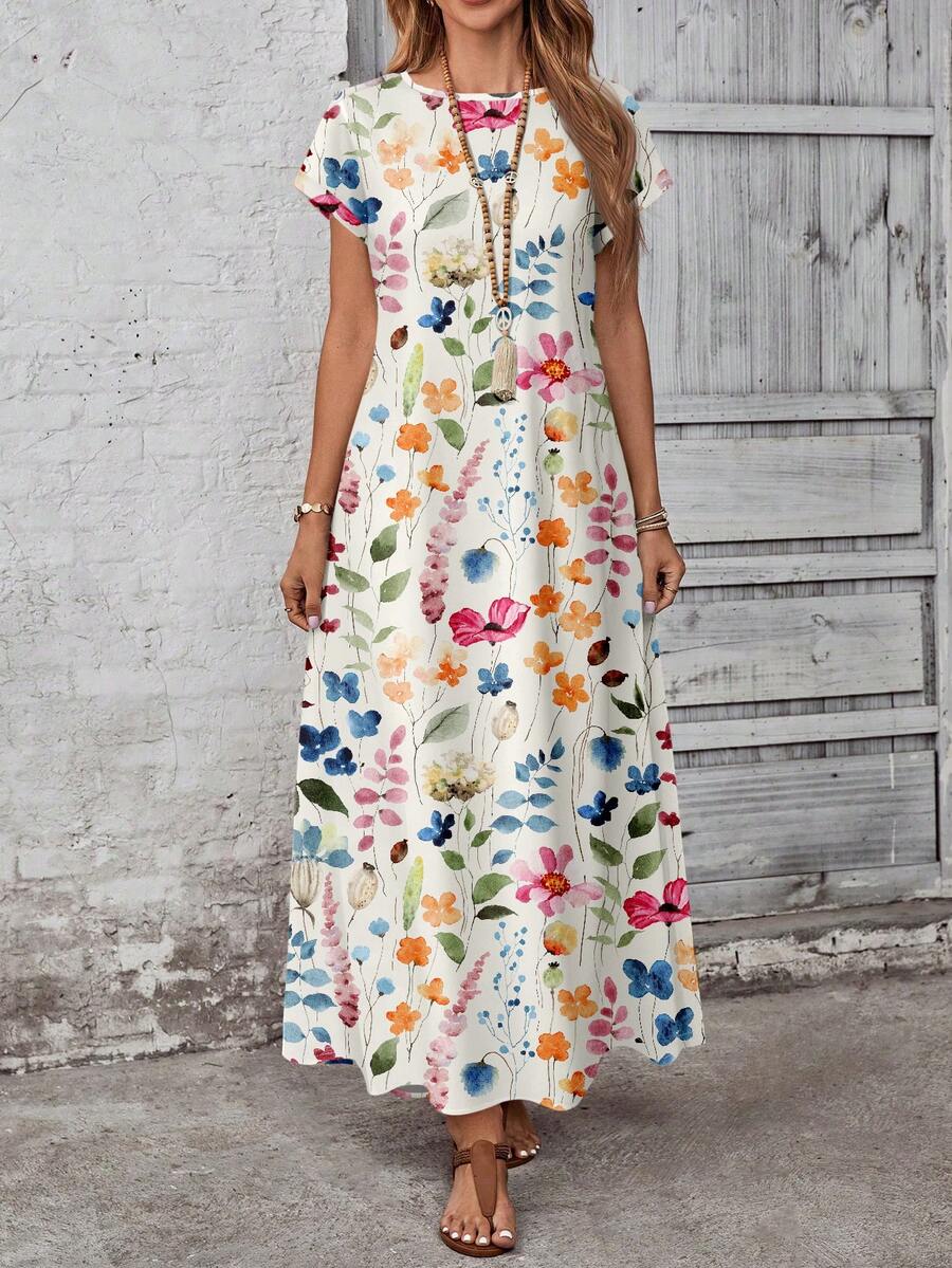 Close front view of multicolor floral maxi dress showing round neck and short sleeves
