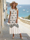 Ivory boho smock dress back view with flounce hem