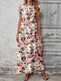 Front view of cream pink rose floral maxi dress with short sleeves