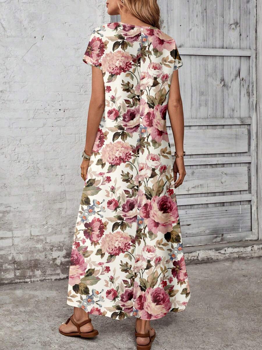 Back view of pink rose floral loose maxi dress with center seam