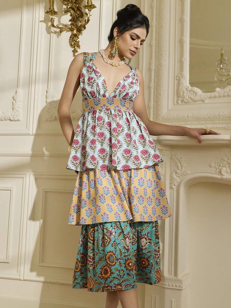 Experience the breathtaking fusion of bohemian heritage and sharp, modern architectural tailoring. This stunning floral ensemble is meticulously designed for the woman who values a high-fashion, "quiet luxury" approach to seasonal dressing—the ultimate centerpiece for prestigious coastal retreats, exclusive garden parties, and high-authority summer social gatherings.