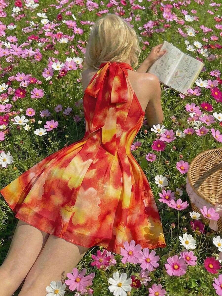 Elevate your summer wardrobe with this stunning tie-dye cinched waist dress, designed for unforgettable beach getaways and vibrant vacation moments. The halter neckline and backless design create a chic, bohemian silhouette, while the high-waisted A-line cut flatters every figure. Crafted from lightweight chiffon with a knot detail and flared hem, this sleeveless beauty offers effortless style and comfort. The lined construction ensures confidence, and the tie-dye pattern adds a playful