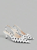 Experience the breathtaking fusion of mid-century cinematic heritage and sharp, modern architectural tailoring. This stunning black and white polka dot ensemble is meticulously designed for the woman who values a high-fashion, 
