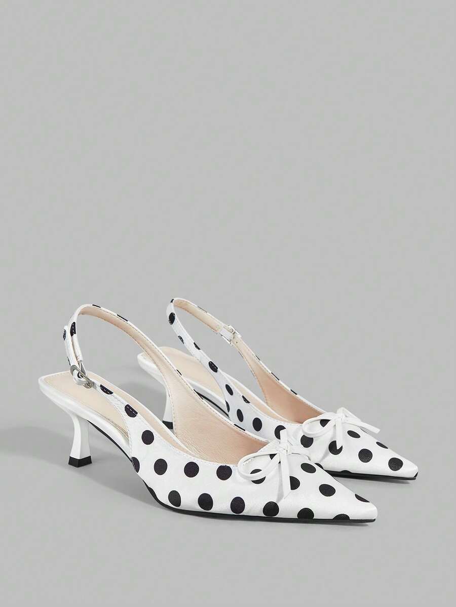 Experience the breathtaking fusion of mid-century cinematic heritage and sharp, modern architectural tailoring. This stunning black and white polka dot ensemble is meticulously designed for the woman who values a high-fashion, "quiet luxury" approach to elegant shoes—the ultimate centerpiece for prestigious social gatherings, exclusive dinner dates, and high-authority urban retreats.