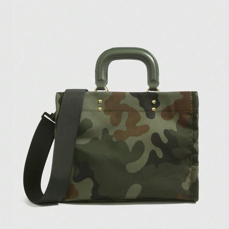 Front view of green camouflage fabric handbag with olive handles and dark adjustable shoulder strap