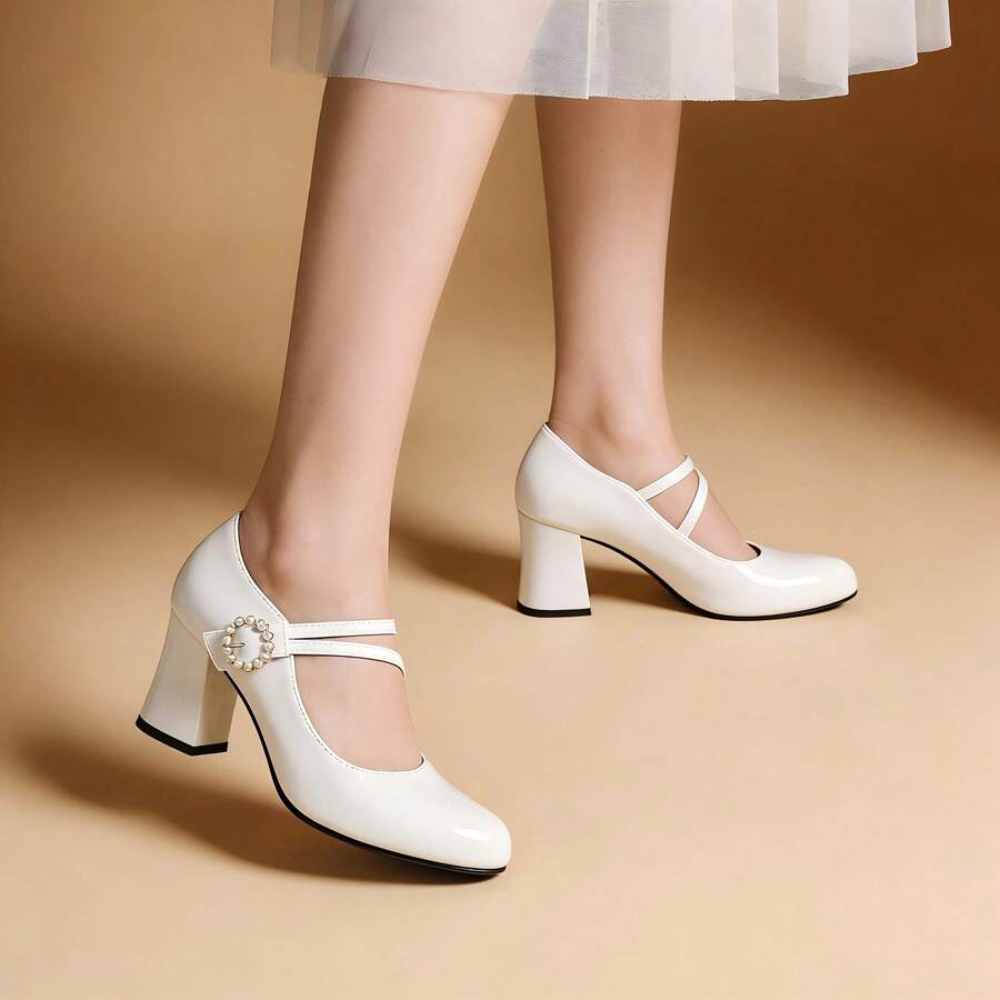 pearl buckle block heel pumps image 1 showing visible shoe design, texture, strap, heel or flat sole details