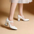 pearl buckle block heel pumps image 1 showing visible shoe design, texture, strap, heel or flat sole details