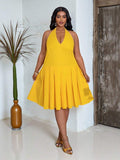 Close-up view of versatile plus-size yellow babydoll maxi dress for festivals, beach days & casual outings with maxi dress silhouette for summer casual wear