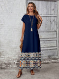 Navy maxi dress with border print hem and simple round neck