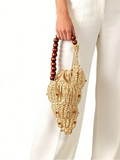 Shell shaped raffia mini bucket bag with wooden bead handle and drawstring pouch
