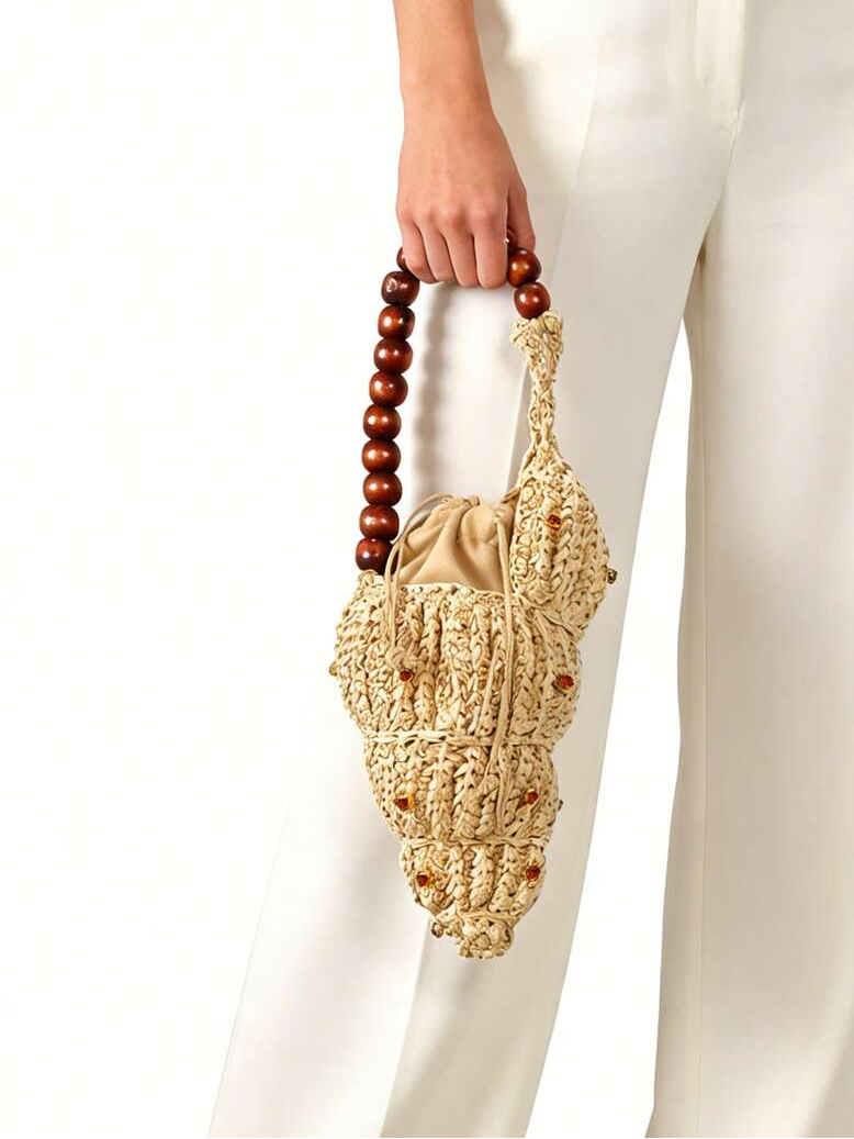 Shell shaped raffia mini bucket bag with wooden bead handle and drawstring pouch