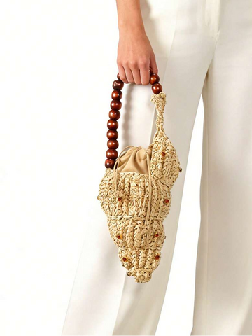 Shell shaped raffia mini bucket bag with wooden bead handle and drawstring pouch