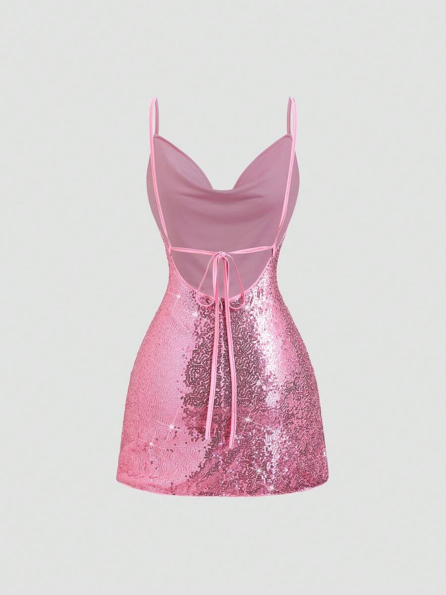 Back view of pink backless sequin dress with bow tie