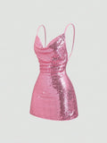 Side view of fitted pink sequin mini dress