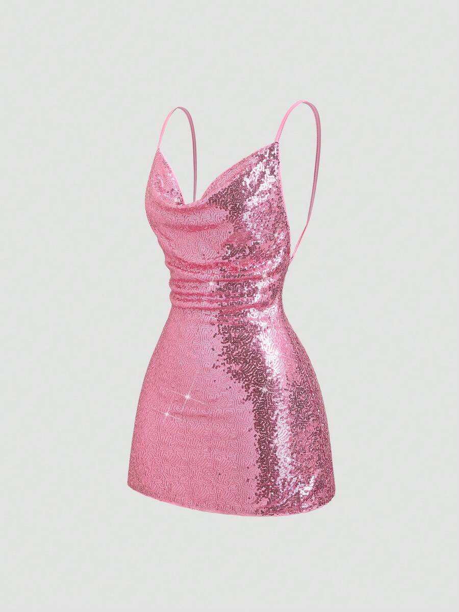 Side view of fitted pink sequin mini dress