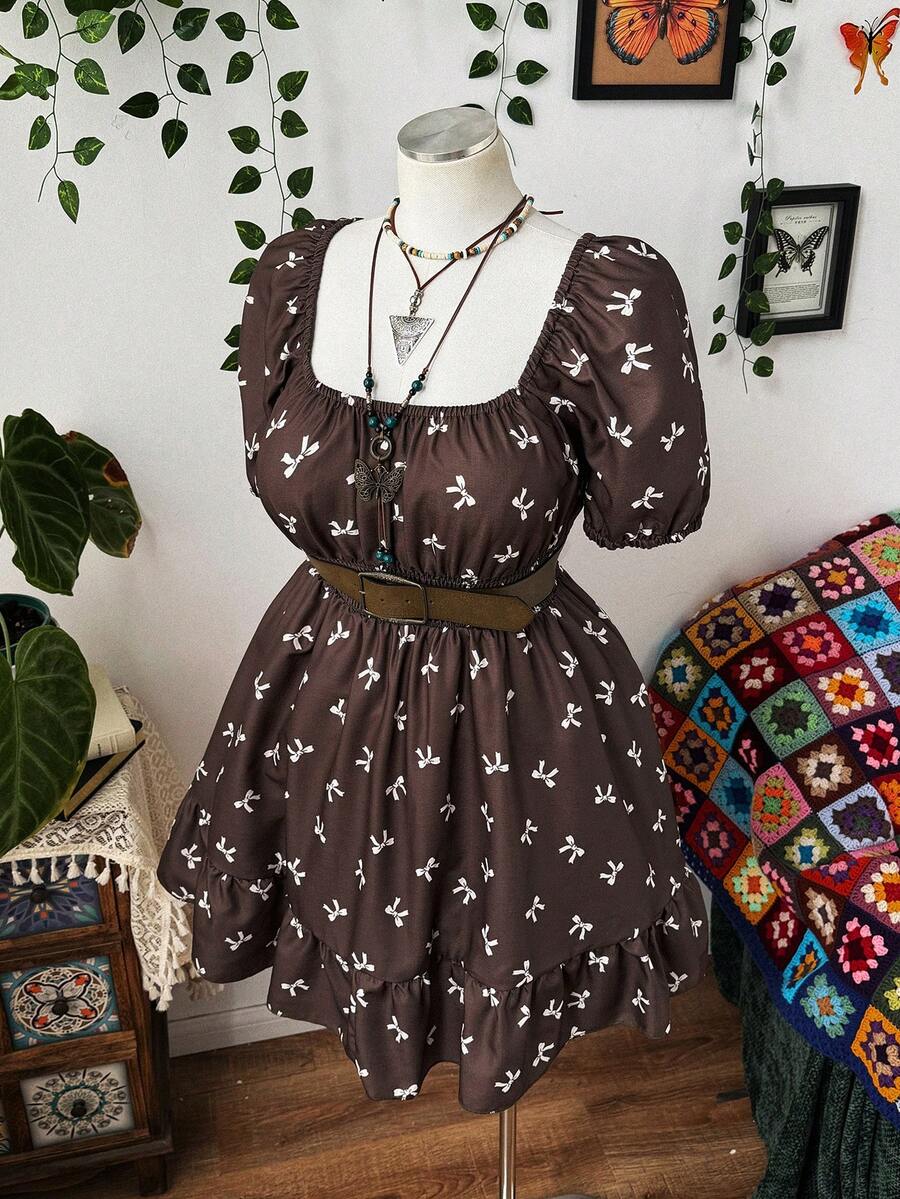 Experience the breathtaking fusion of heritage playful artistry and sharp, modern architectural tailoring. This stunning bow-printed ensemble is meticulously designed for the woman who values a high-fashion, "quiet luxury" approach to seasonal dressing—the ultimate centerpiece for prestigious weekend retreats, exclusive social gatherings, and high-authority casual-chic events.