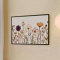 Angled wall mockup of pressed botanical flower poster in a thin black display frame