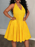 Close-up view of versatile plus-size yellow babydoll maxi dress for festivals, beach days & casual outings with maxi dress silhouette for summer casual wear